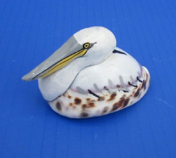 Wholesale 2-3/4 to 3-1/4 inches Painted Tiger Cowrie Pelican Novelties - 12 pcs @ $2.25 each; 60 pcs @ $2.00 each