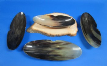 11 inches Wholesale Boat Shaped Buffalo Horn Bowls with "V" shape indentation on both sides - 2 pcs @ $12.50 each; 6 pcs @ $11.00 each