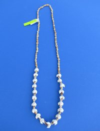 36 inches shell leis wholesale made out of nassa shells - $6.00 a dozen; 