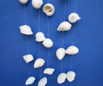 Wholesale Shell Dream Catcher with assorted white shells 23 inches long - 5 pcs @ $4.00 each