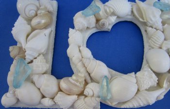 Wholesale 12 inch "Love" seashell wall plaque - 2 pcs @ $5.00 each; 18 pcs @ 4.50 each